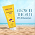 Sonama Naturals sunscreen tube with beach background
