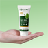 Tube of Sonama Naturals Neem & Tulsi Face Wash held in a hand against a green background